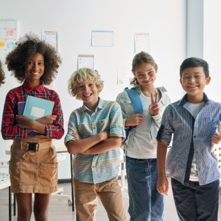 Group of smiling children at school