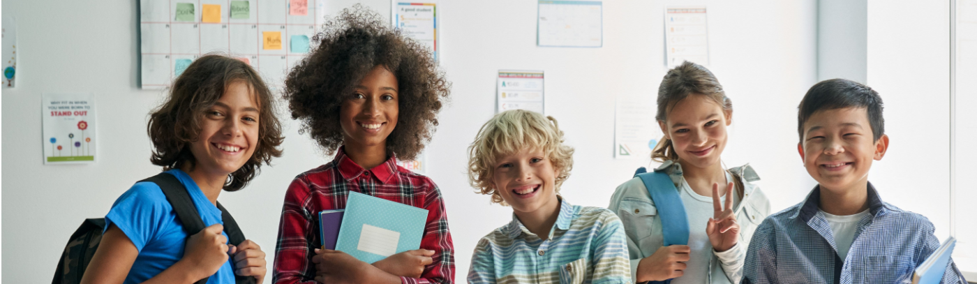 Group of smiling children at school