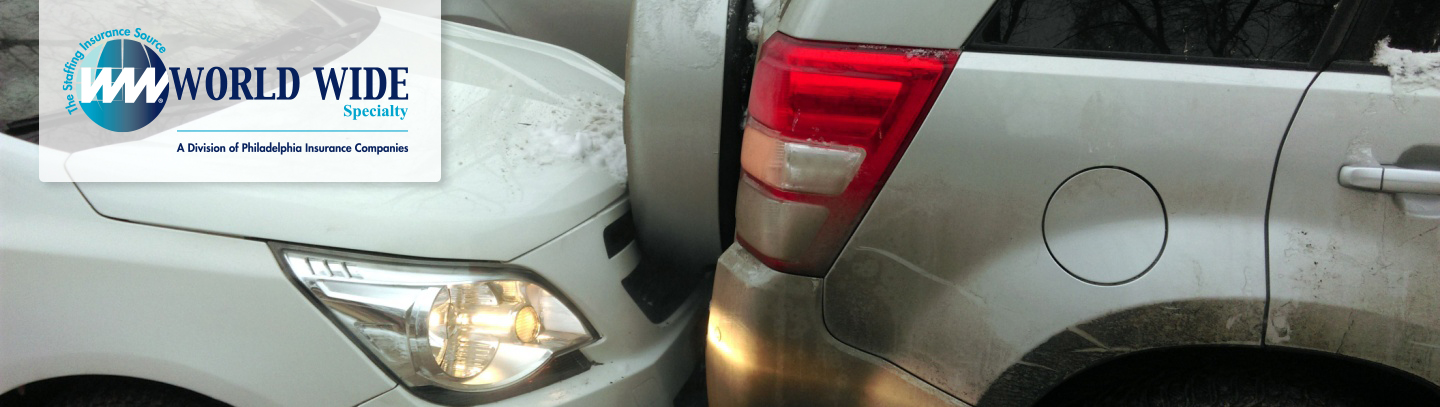A car rear-ends an SUV on a snowy road. 