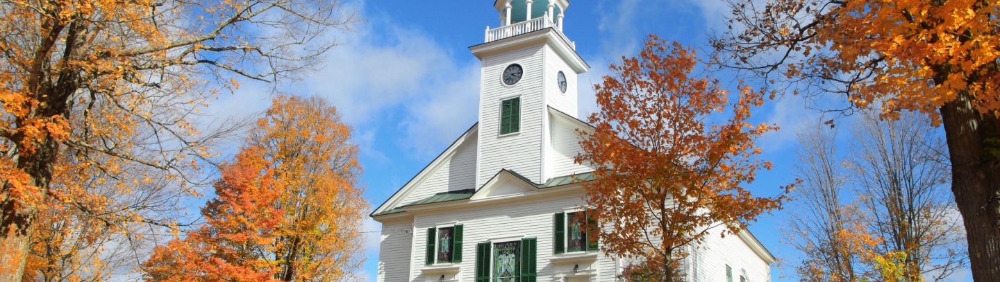 Religious buildings often require unique church insurance coverage, such as this colonial New England church. 