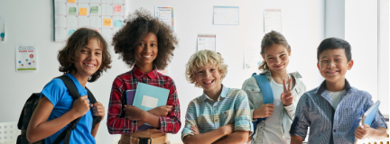 Group of smiling children at school